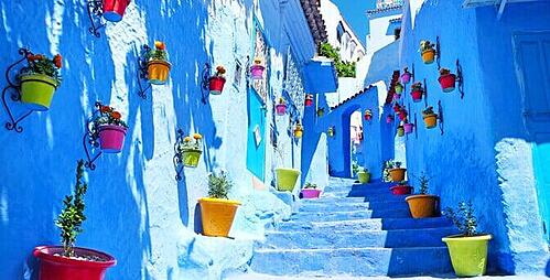 The celebrated blue streets of Chefchaouen in the Rif Mountains, a picturesque destination on tailored Morocco tours.